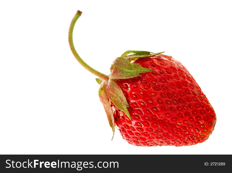 Strawberry close-up isolated over a white background