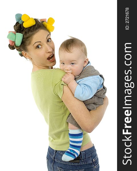 Young, beautiful woman with baby on hands. Baby is biting mother's arm. Mother is looking at camera. White background. Young, beautiful woman with baby on hands. Baby is biting mother's arm. Mother is looking at camera. White background