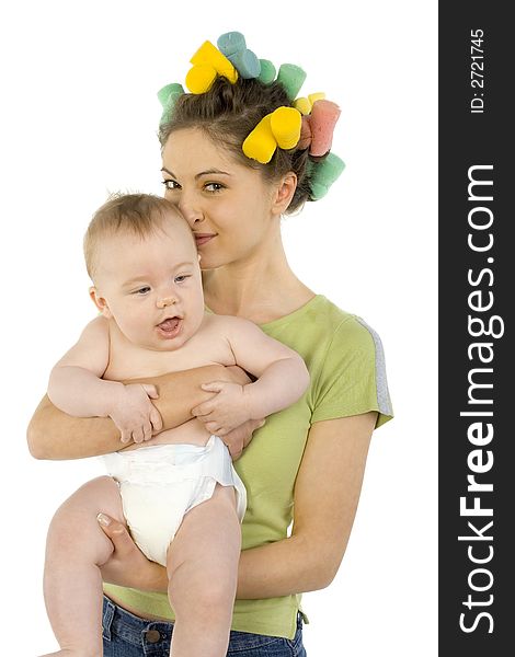 Young, beautiful woman with baby on hands. Hugging baby and smiling. Looking at camera, white background. Young, beautiful woman with baby on hands. Hugging baby and smiling. Looking at camera, white background