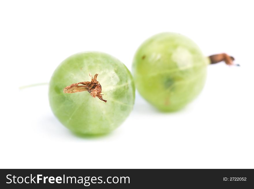 Two green gooseberrys. Isolated white. Two green gooseberrys. Isolated white.