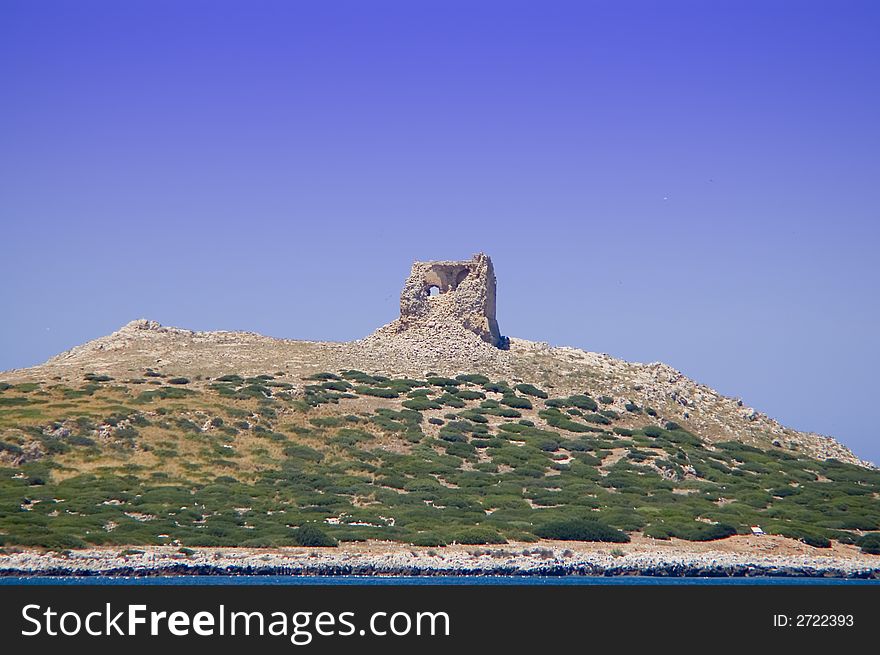 A little island whit an ancient tower ruins near isola delle femmine (PA) Sicily. A little island whit an ancient tower ruins near isola delle femmine (PA) Sicily