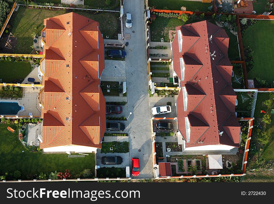 An area with new houses build in green fields. An area with new houses build in green fields