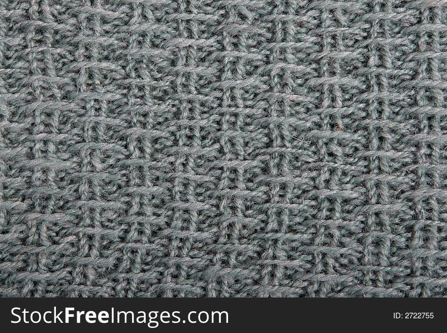 The pattern of a product from a wool in the form of a background. The pattern of a product from a wool in the form of a background