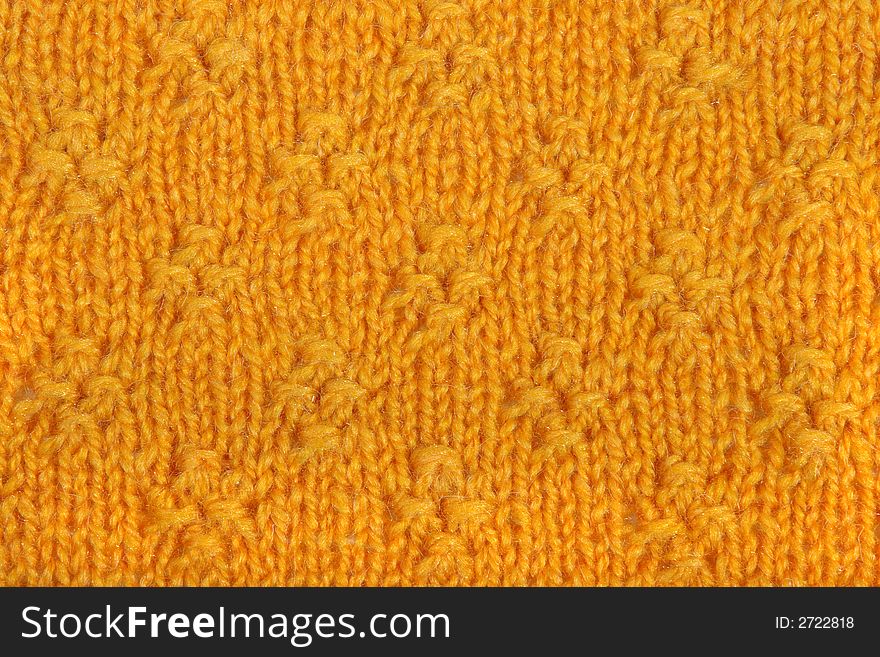 The pattern of a product from a wool in the form of a background. The pattern of a product from a wool in the form of a background