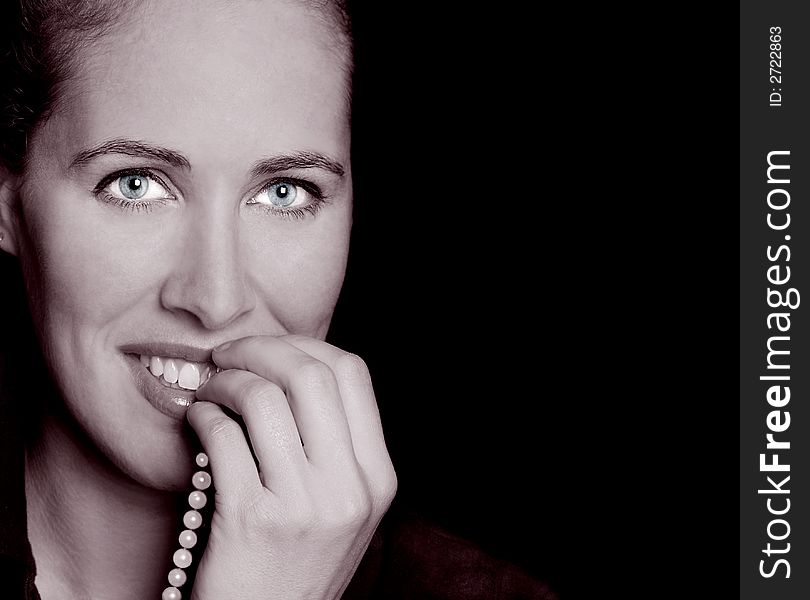 Beautiful Black and white Portrait of a woman with pearls