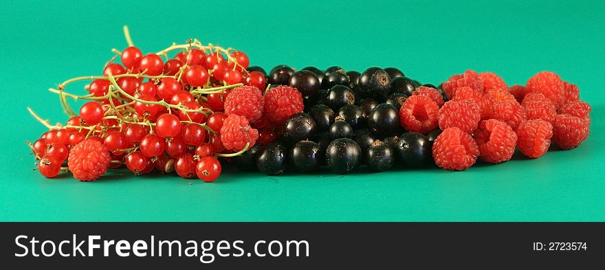 Berries On A Green Background.