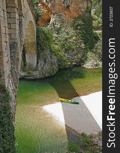 Canoe at the edge of a river with its
paddles. Canoe at the edge of a river with its
paddles