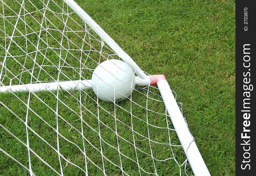 Soccer ball in a goalpost