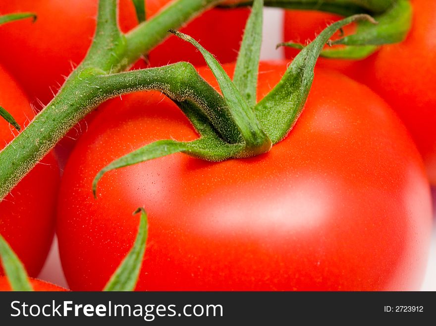 Close-up of red tomatoes with stem