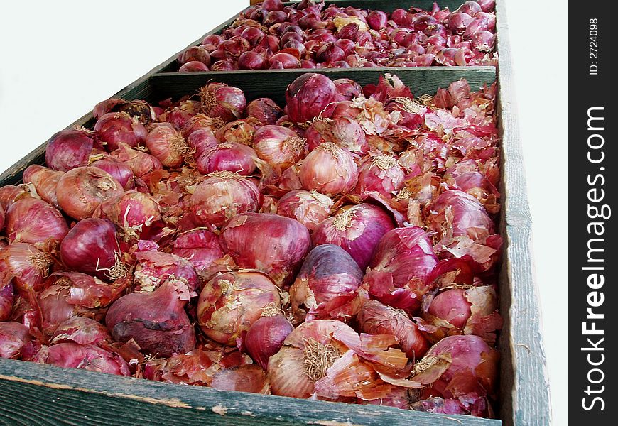 Onions in boxes for sale