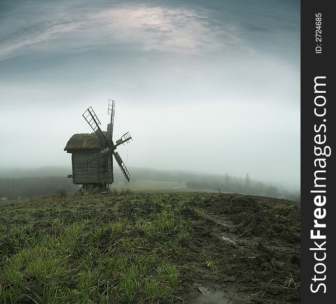 Old mill in Ukrainian autumn field. Old mill in Ukrainian autumn field