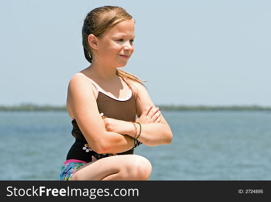 Girl at waters edge