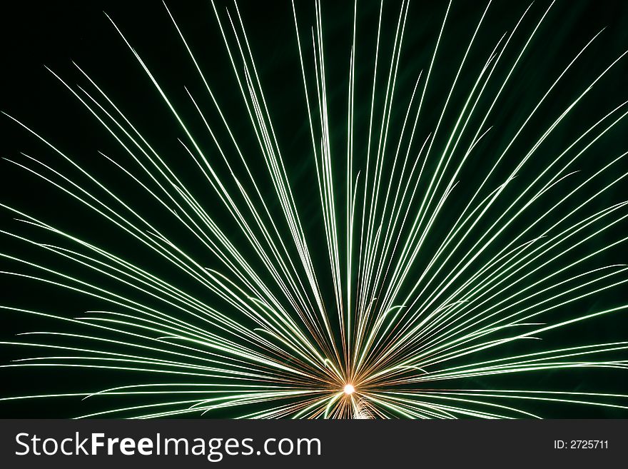 An image of exploding fireworks at night.