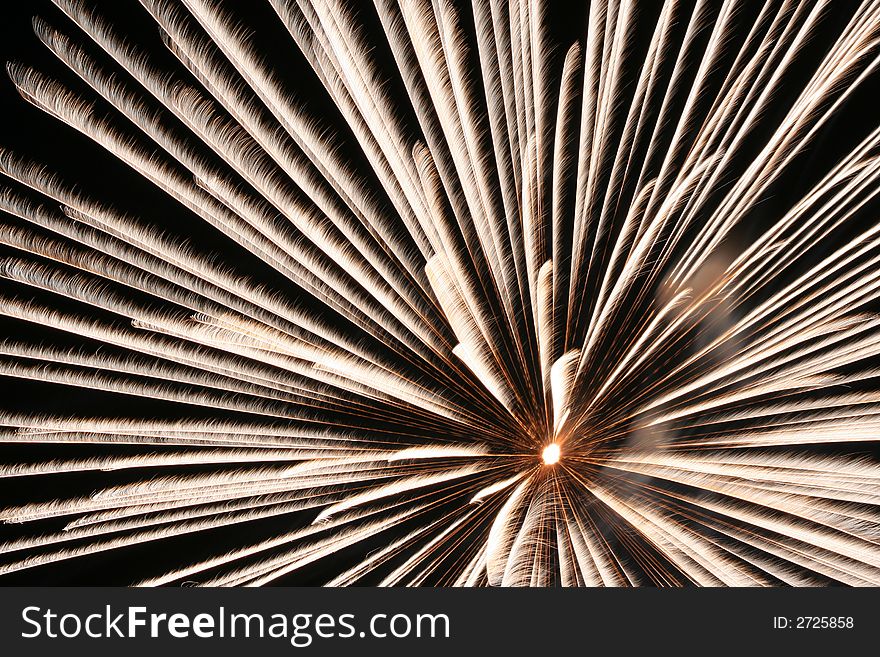 An image of exploding fireworks at night.