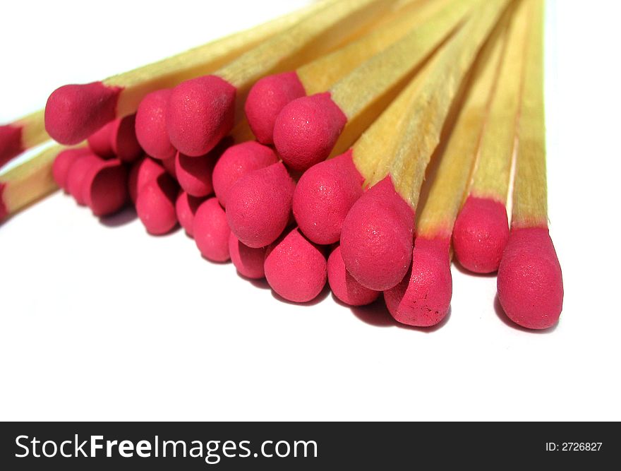 isolated matches with red head