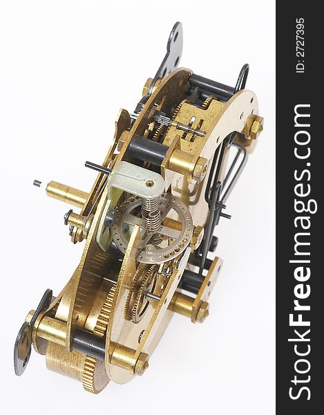 Old gold-coloured clockwork with many little cogwheels