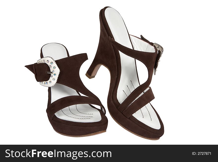 Female shoes from brown suede on a white background