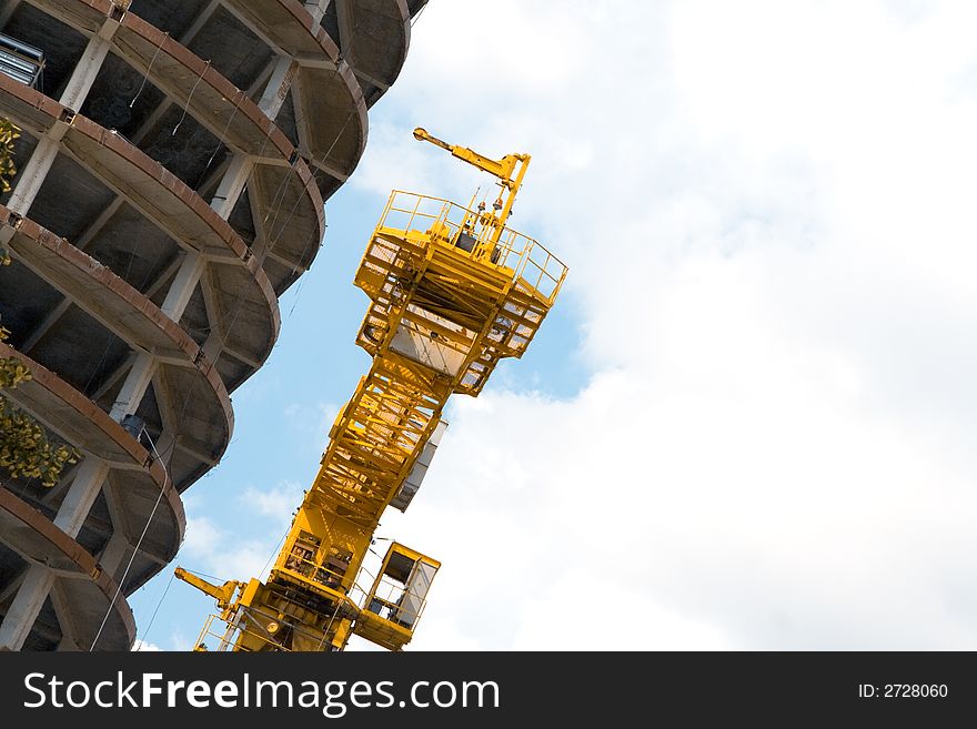 Skyscraper in construction. blue sky background