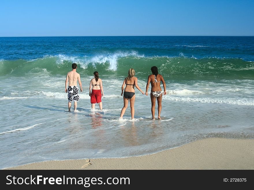 Teenager friends together at the beach. Teenager friends together at the beach.