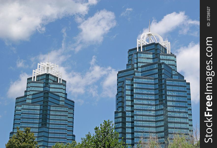 A pair of modern glass office towers. A pair of modern glass office towers