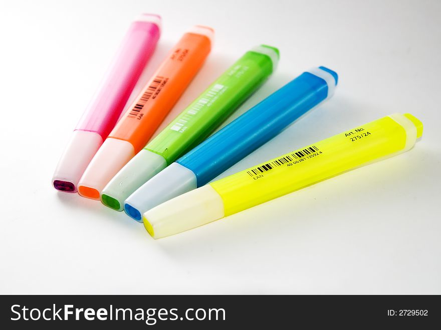 A variety of different bright coloured highlighter pens. Used oftenly in offices and school. A variety of different bright coloured highlighter pens. Used oftenly in offices and school