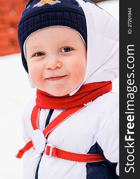 Portrait of happy baby in winter outdoors. Portrait of happy baby in winter outdoors