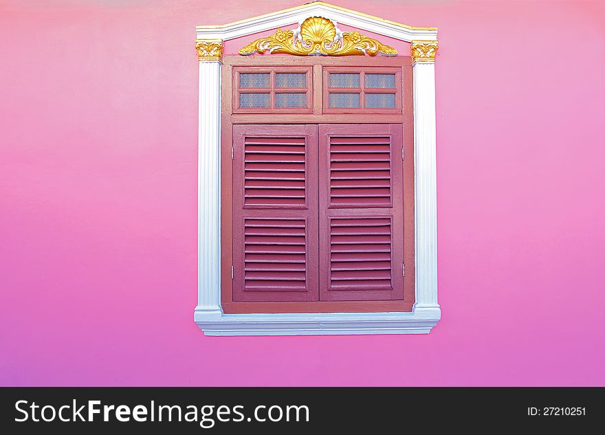 Old wood windows on pink