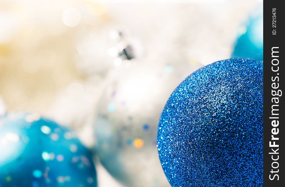 Christmas background with blue and silver ornaments