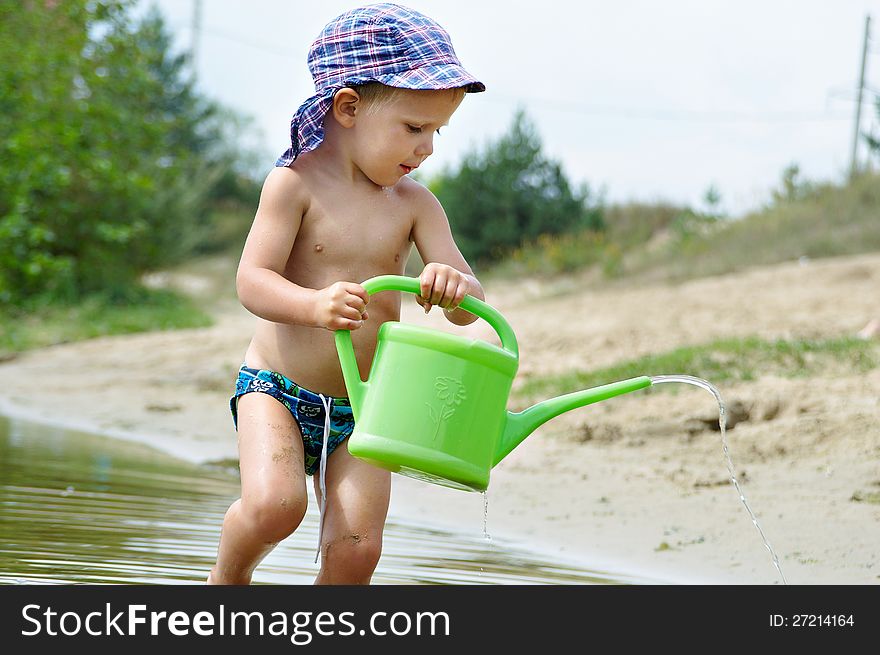 Little boy playing on the beach