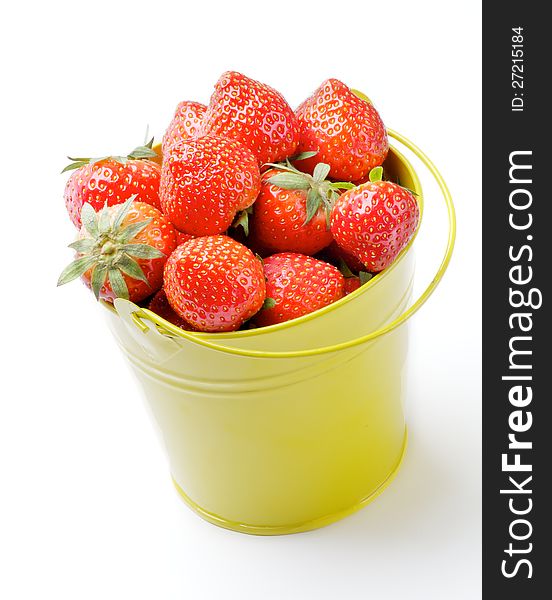 Perfect Raw Strawberries inside Yellow Bucket  on white background