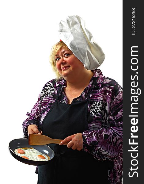Cute plump woman in a chef's hat offers fried eggs on the pan. Cute plump woman in a chef's hat offers fried eggs on the pan