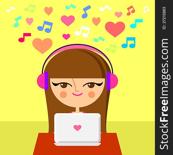 Cute girl listening to music on the laptop wearing headphones