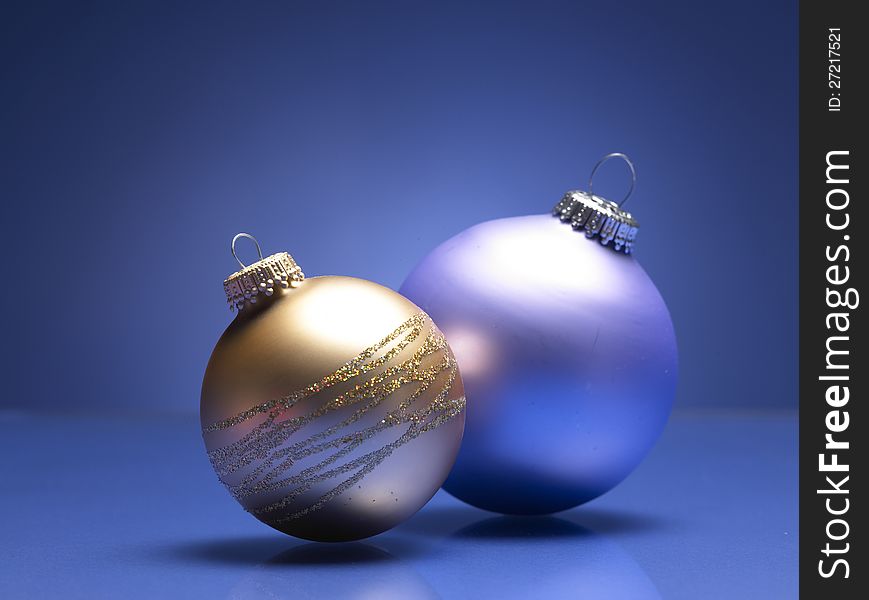 Christmas balls on the blue background