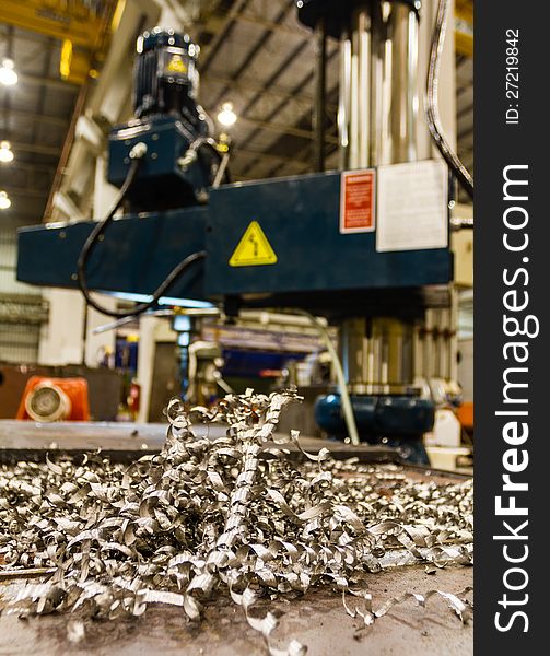 Scrap from drilling machine on steel