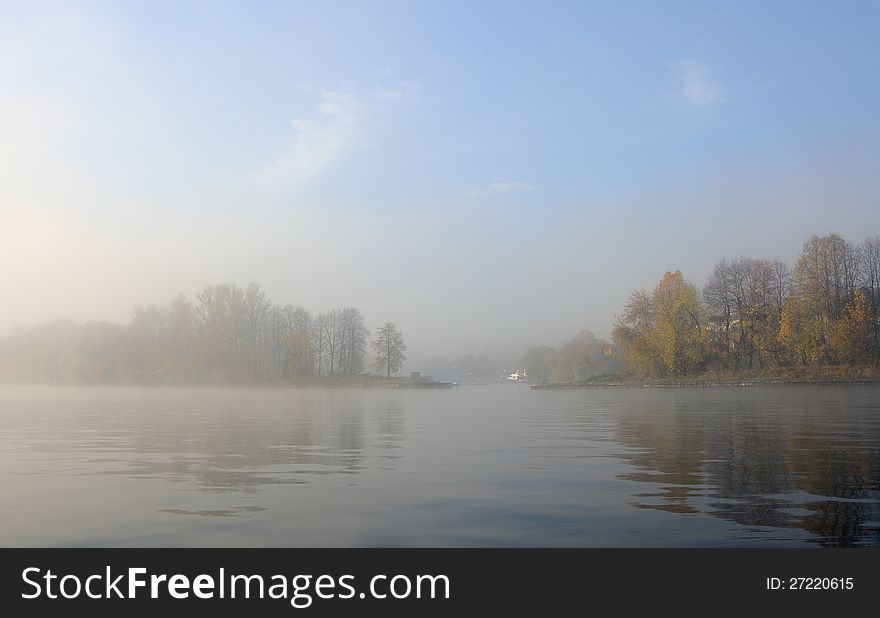 Autumn foggy morning on the river