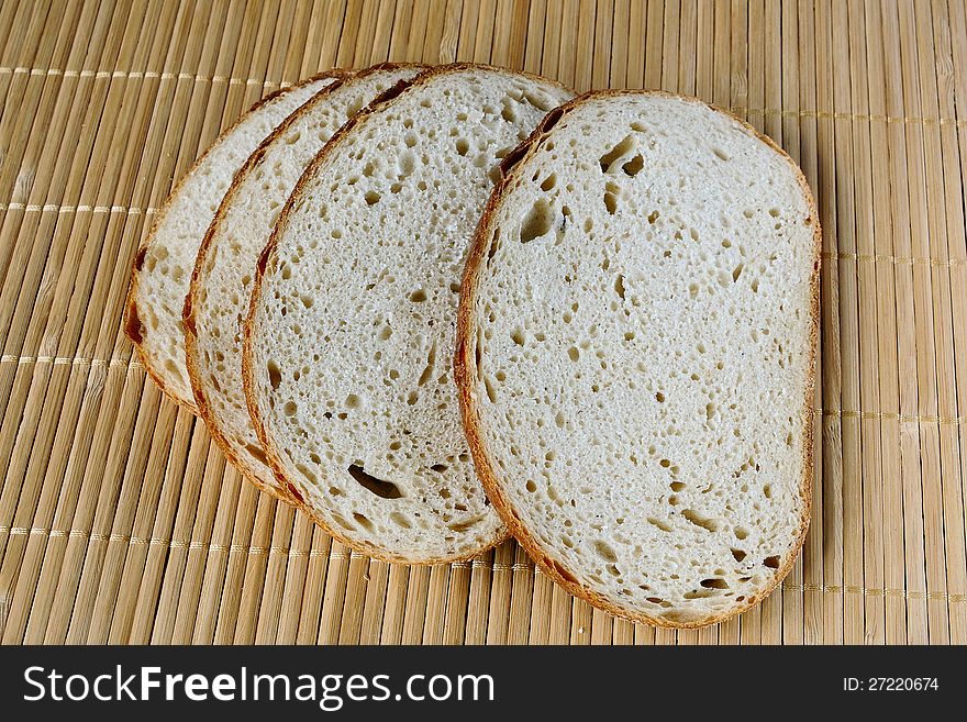 Bread chunks on a mat