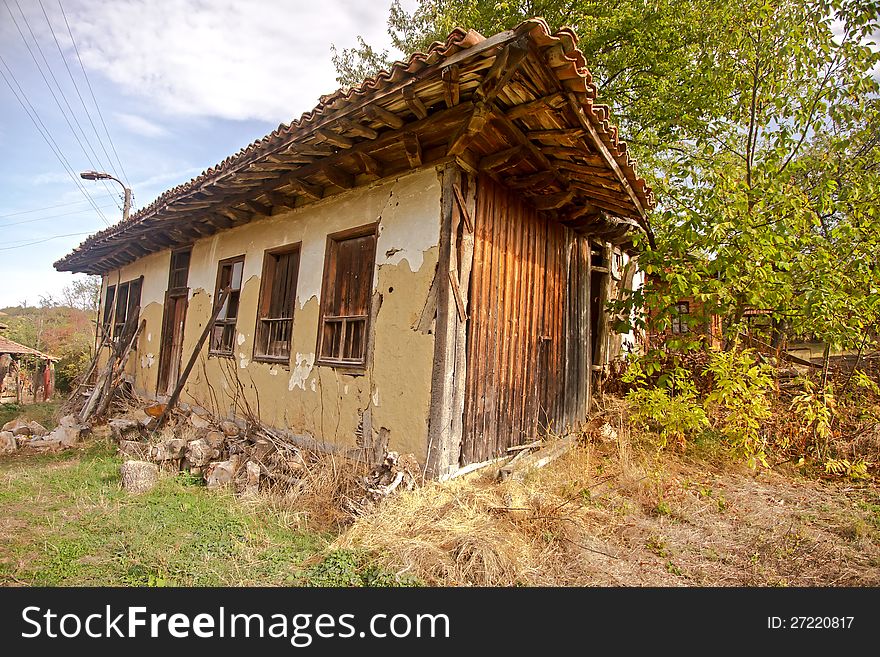 Abandoned wooden house in the mountain village. Abandoned wooden house in the mountain village.