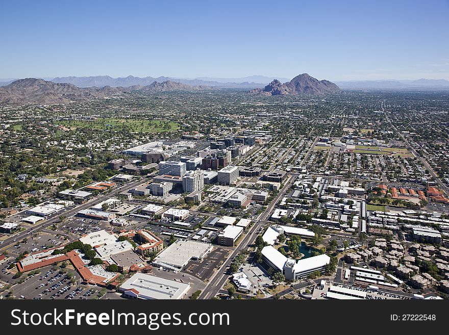 Aerial view of financial district under desert skies. Aerial view of financial district under desert skies