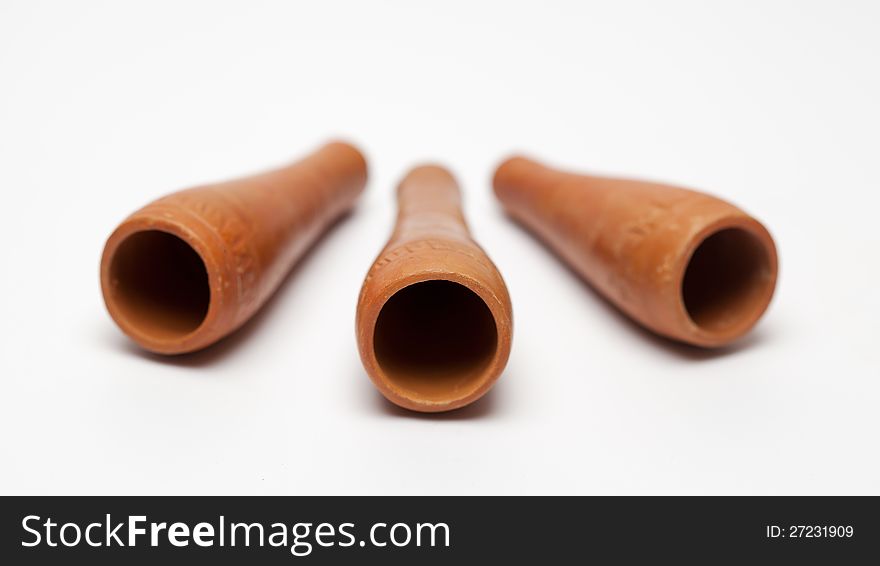 Three Smoking clay pipe