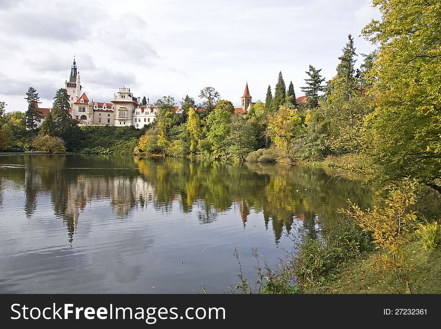 Pruhonice park and castle with reflection in the water in the fall. Pruhonice park and castle with reflection in the water in the fall