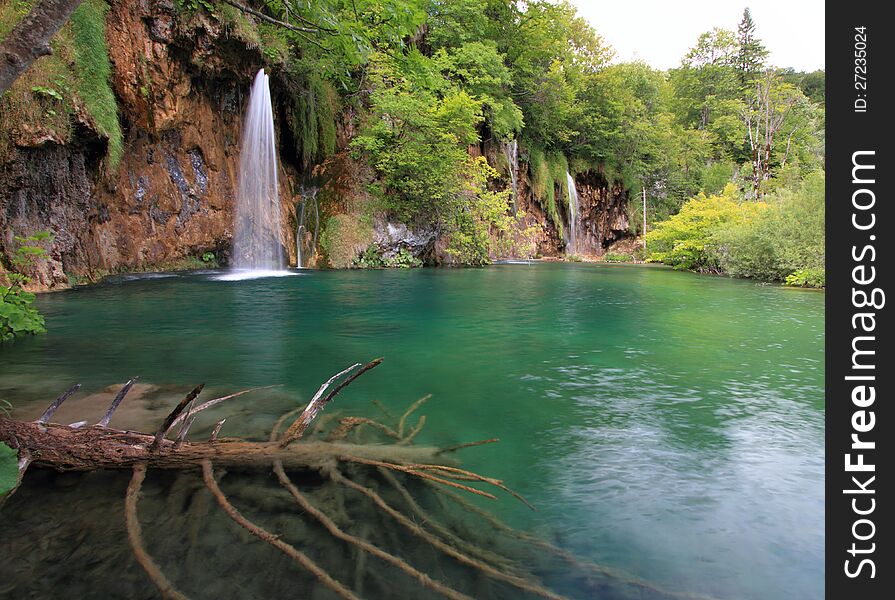 Waterfall in Plitvice national park croatia (southeast europe) during summer. The national park was founded in 1949 and is situated in the mountainous karst area of central Croatia, at the border to Bosnia and Herzegovina. Waterfall in Plitvice national park croatia (southeast europe) during summer. The national park was founded in 1949 and is situated in the mountainous karst area of central Croatia, at the border to Bosnia and Herzegovina.