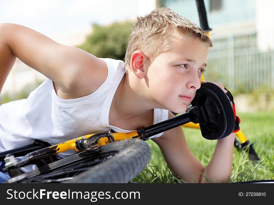 Sport boy and bike outside