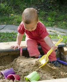 Child Playing In Sandbox Royalty Free Stock Photo Child Playing In Sandbox Royalty Free Stock Photo