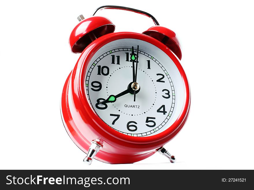 Classic red alarm clock on a white background. Classic red alarm clock on a white background