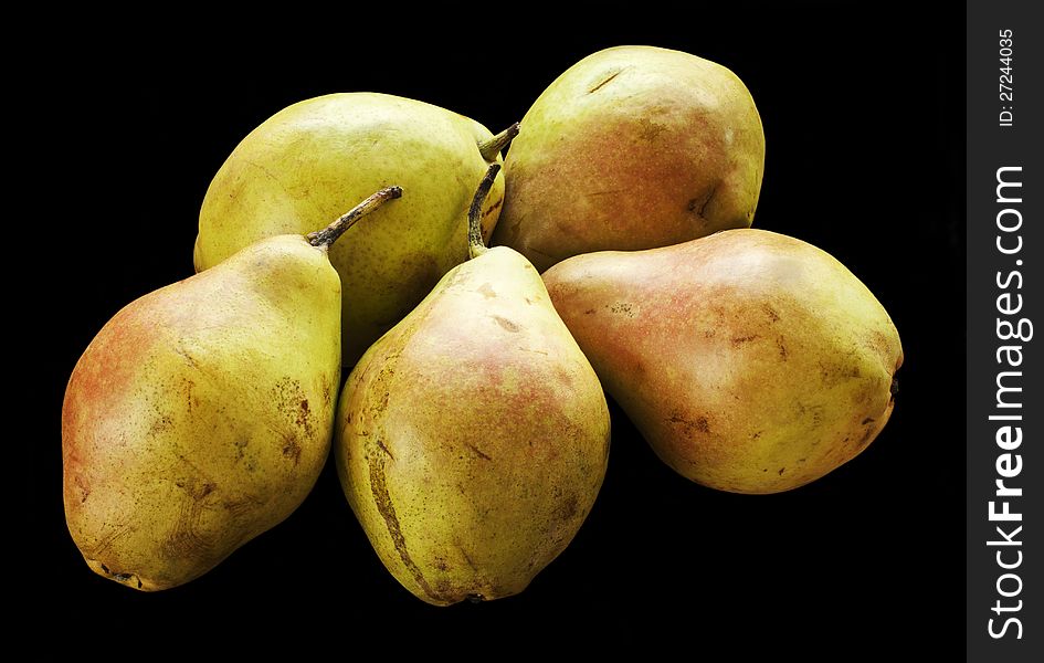 Fresh pears over  black background