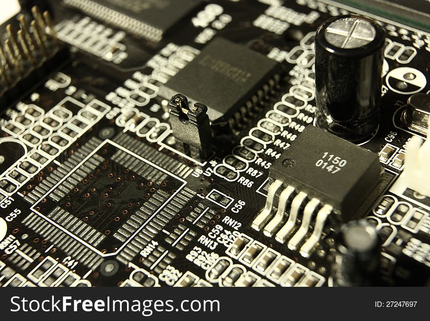 Electronic components on a printed circuit board. Electronic components on a printed circuit board