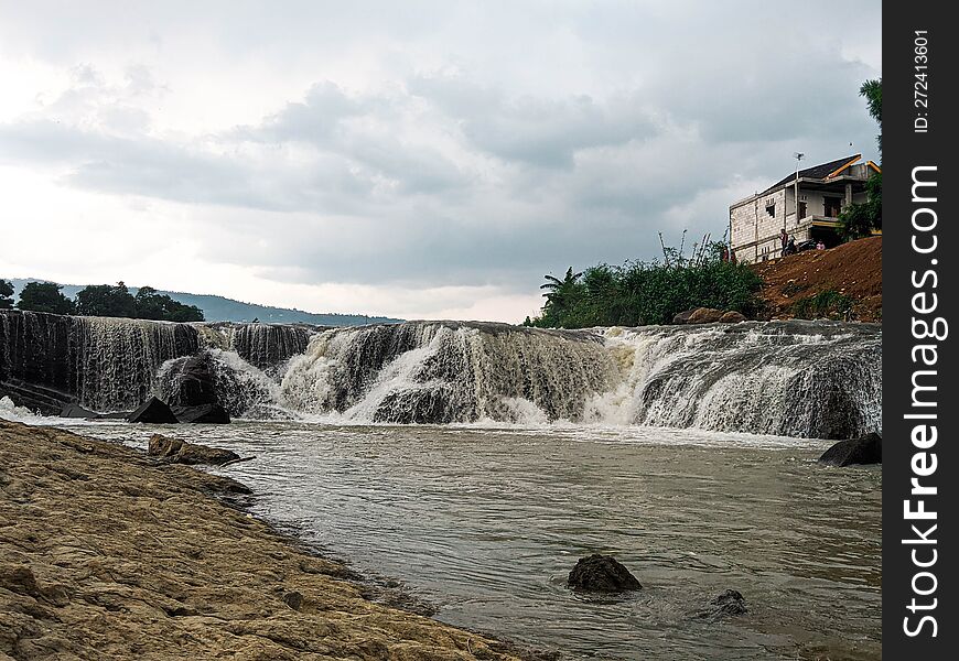 landscape view of waterfall on river