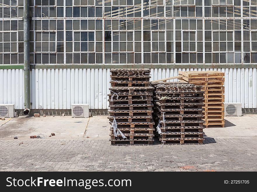 Crates outside factory in industrial setting - landscape exterior