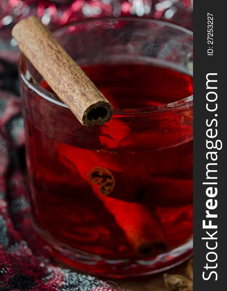 Mulled wine with cinnamon in a glass beaker