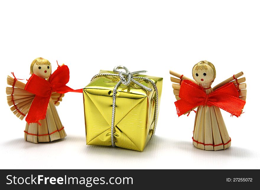 Christmas decoration - wooden angel with a gift. Christmas decoration - wooden angel with a gift